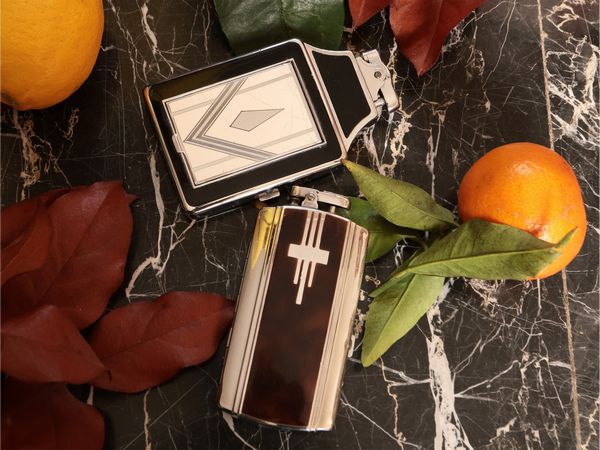 Due portasigarette-accendino Art Dec in metallo e smalti, Ronson  - Asta Due case fiorentine - Associazione Nazionale - Case d'Asta italiane