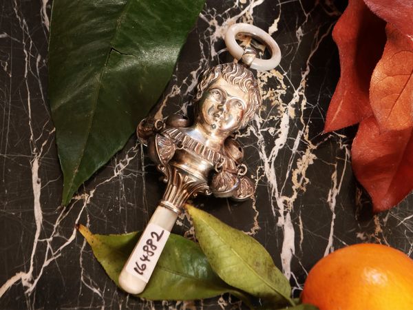 Sonaglio per bambini in argento  - Asta Due case fiorentine - Associazione Nazionale - Case d'Asta italiane