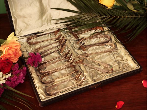 Serie di undici pinze da escargot in argento  - Asta Due case fiorentine - Associazione Nazionale - Case d'Asta italiane