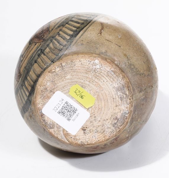 Boccale<BR>Italia centrale Lazio (?), seconda met del XV secolo<BR><BR>Maiolica arcaica. Altezza cm 17 circa. Conservazione: importante rifacimento nella parte superiore attorno al manico e al collo<BR>  - Asta Maioliche e Porcellane - Associazione Nazionale - Case d'Asta italiane