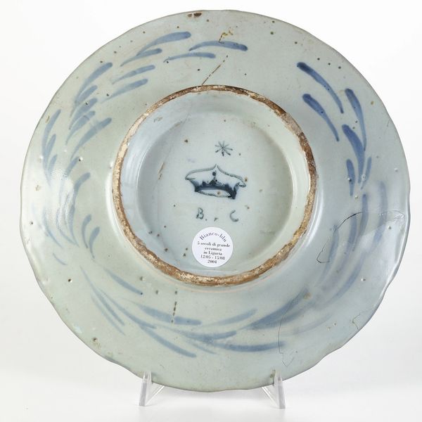 Sottocoppa<BR>Albisola, fabbrica di Bernardo Conrado, ultimo quarto del XVII secolo<BR>  - Asta Maioliche e Porcellane - Associazione Nazionale - Case d'Asta italiane