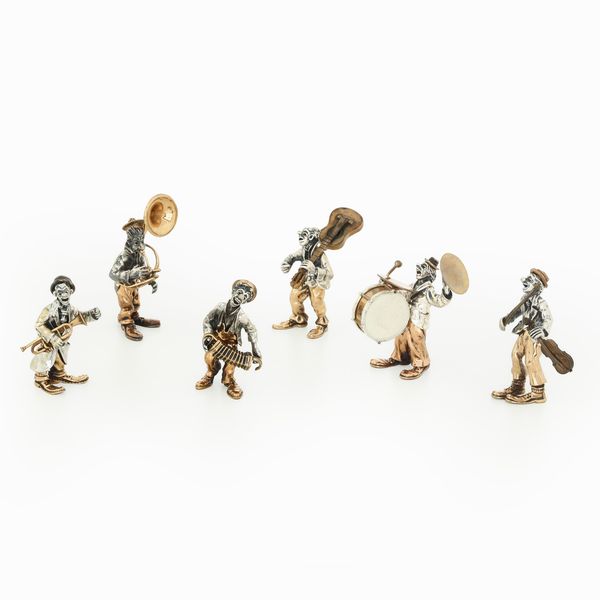 Sei sculturine di musici in argento, vermeille e bronzo. Firmati Angini. Punzone argentiere: stella 105 AR, Pietro Sorini & Casi Ilario S.d.f.  - Asta Argenti e Icone - Associazione Nazionale - Case d'Asta italiane