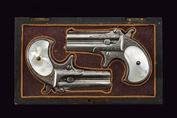 Delizioso paio di pistole Remington double Deringer in cassetta  - Asta Rare Armi Antiche e Militaria da tutto il mondo - Associazione Nazionale - Case d'Asta italiane