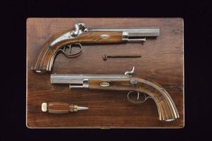 Paio di pistole a luminello di Flachat in cassetta  - Asta Rare Armi Antiche e Militaria da tutto il mondo - Associazione Nazionale - Case d'Asta italiane