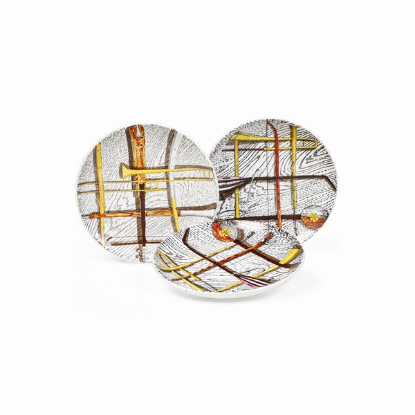 Tre sottobicchieri Orchestra.<BR>Milano, Fornasetti, 1950 circa.  - Asta Maioliche e Porcellane - Associazione Nazionale - Case d'Asta italiane