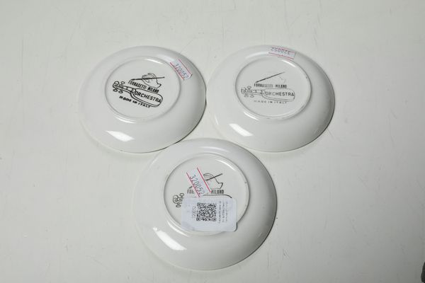 Tre sottobicchieri Orchestra.<BR>Milano, Fornasetti, 1950 circa.  - Asta Maioliche e Porcellane - Associazione Nazionale - Case d'Asta italiane
