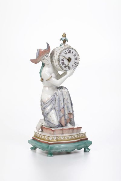 Orologio da tavolo Art Dco.<BR>Germania, Manifattura di Nymphenburg, 1930 circa.<BR>Modello di Josef Wackerle del 1922.<BR>  - Asta Maioliche e Porcellane - Associazione Nazionale - Case d'Asta italiane