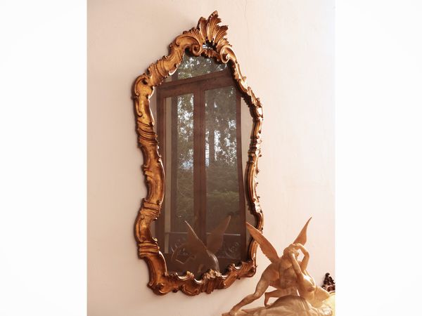 Specchiera in legno intagliato e dorato  - Asta Dimore fiorentine - Associazione Nazionale - Case d'Asta italiane