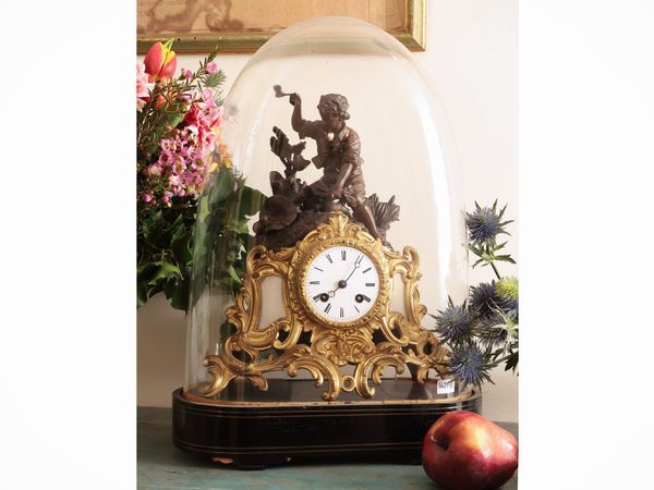 Orologio in antimonio patinato e dorato  - Asta Dimore fiorentine - Associazione Nazionale - Case d'Asta italiane