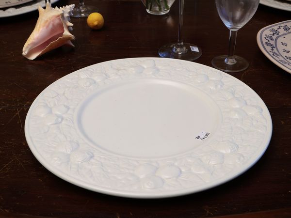 Serie di dodici sottopiatti in ceramica  - Asta Dimore fiorentine - Associazione Nazionale - Case d'Asta italiane