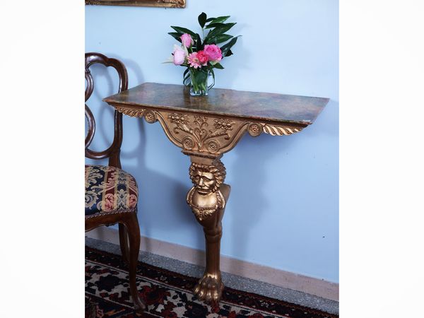 Tavolino console in legno intagliato e dorato  - Asta Dimore fiorentine - Associazione Nazionale - Case d'Asta italiane