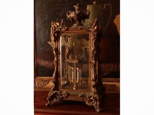 Orologio da tavolo in antimonio e metallo  - Asta Dimore fiorentine - Associazione Nazionale - Case d'Asta italiane