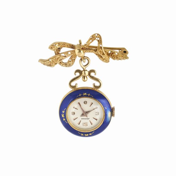 SPILLA A FORMA DI FIOCCO CON OROLOGIO PENDENTE  - Asta OROLOGI - Associazione Nazionale - Case d'Asta italiane