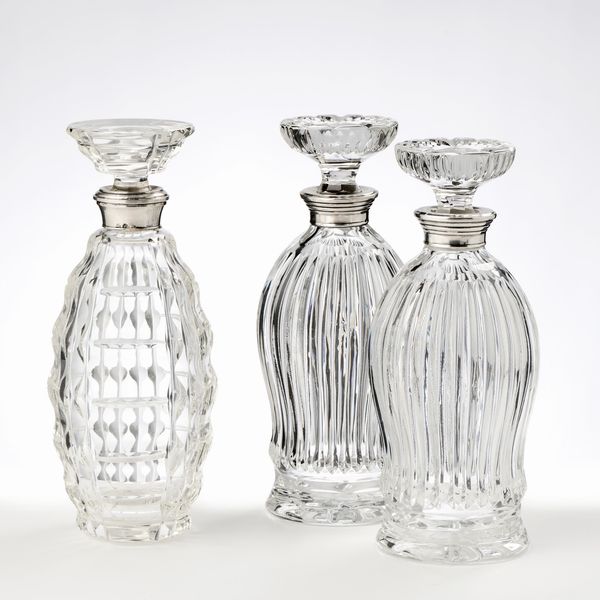 Tre bottiglie in vetro molato e argento  - Asta L'Arte della Tavola - Associazione Nazionale - Case d'Asta italiane