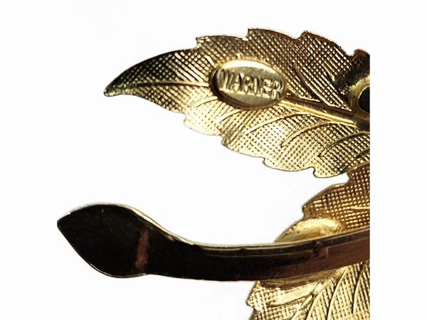 Warner - Spilla meccanica Day to Night  - Asta Vintagemania - Associazione Nazionale - Case d'Asta italiane