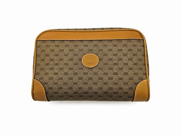Gucci - Pochette in tela micro monogram GG e pelle beige  - Asta Vintagemania - Associazione Nazionale - Case d'Asta italiane