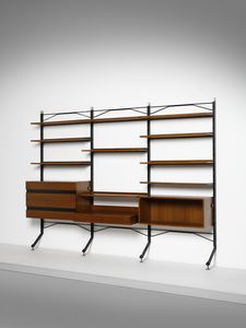 PARISI ICO (1916 - 1996) - Libreria componibile a tre campate M5 della serie Urio a dieci ripiani, stipo a giorno, cassettiera a quattro cassetti e scrittoio a due cassettini sottopiano, esecuzione M.I.M., Roma