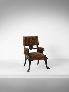 MANIFATTURA INGLESE - Poltrona ecclettica di ispirazione ottomana con braccioli e gambe zoomorfe