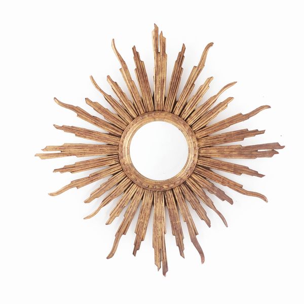 Specchiera circolare in legno intagliato e dorato a raggiera  - Asta Antiquariato - Associazione Nazionale - Case d'Asta italiane