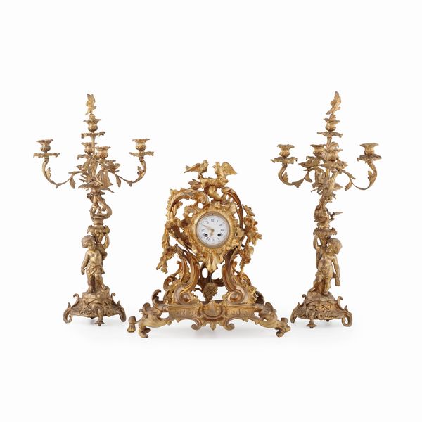 Trittico in bronzo dorato da camino, Francia Worms  Paris  - Asta Antiquariato - Associazione Nazionale - Case d'Asta italiane