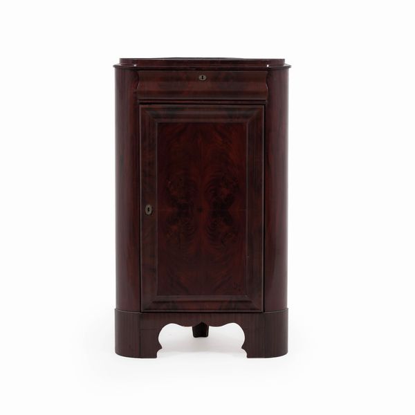 Angolare ad un'anta in piuma di mogano. XIX secolo  - Asta Antiquariato - Associazione Nazionale - Case d'Asta italiane