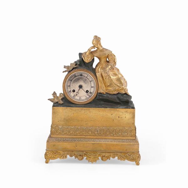 Pendola da tavolo in metallo dorato. XIX-XX secolo  - Asta Antiquariato - Associazione Nazionale - Case d'Asta italiane