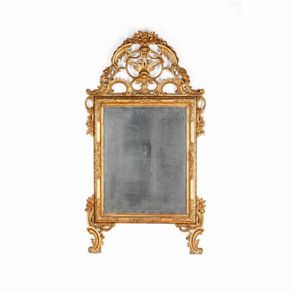 Specchiera in legno intagliato e dorato. XIX-XX secolo  - Asta Antiquariato - Associazione Nazionale - Case d'Asta italiane