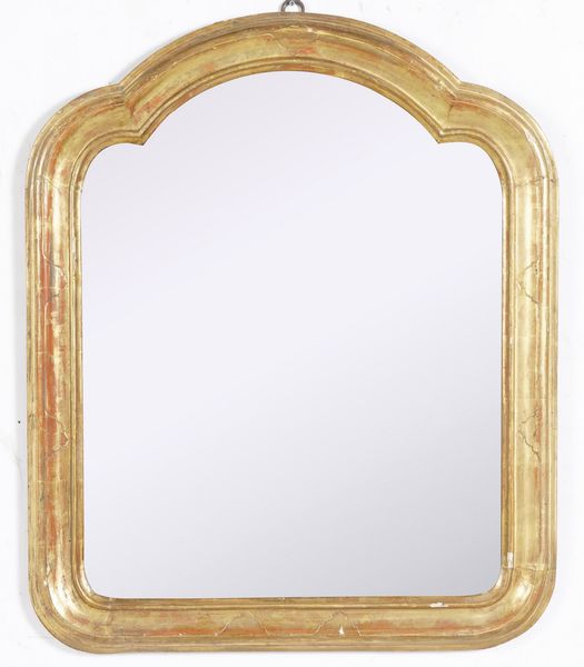 Specchiera centinata in legno intagliato e dorato. XIX secolo  - Asta Antiquariato - Associazione Nazionale - Case d'Asta italiane