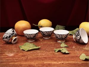 Piero Fornasetti - Serie di cinque coppette da aperitivo in ceramica snmaltata