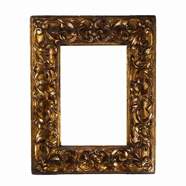 Cornice in legno intagliato edorato. Emilia XVII secolo  - Asta Cornici antiche - Associazione Nazionale - Case d'Asta italiane