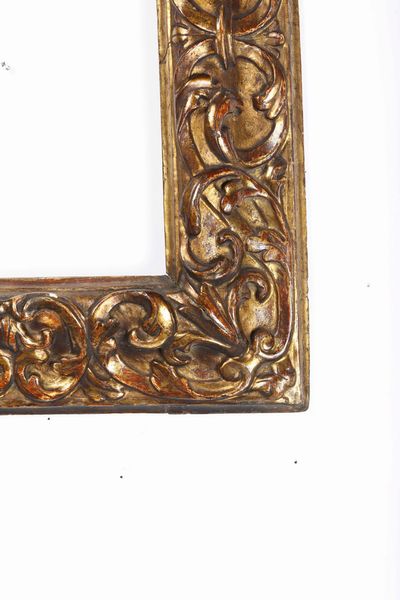 Cornice in legno intagliato edorato. Emilia XVII secolo  - Asta Cornici antiche - Associazione Nazionale - Case d'Asta italiane