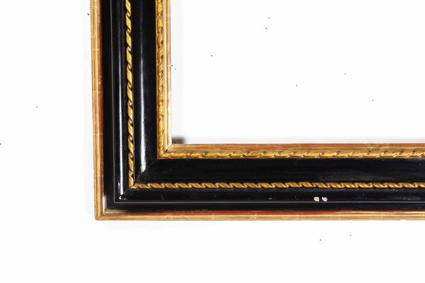 Cornice in legno ebanizzato e dorato. Roma XVII secolo  - Asta Cornici antiche - Associazione Nazionale - Case d'Asta italiane
