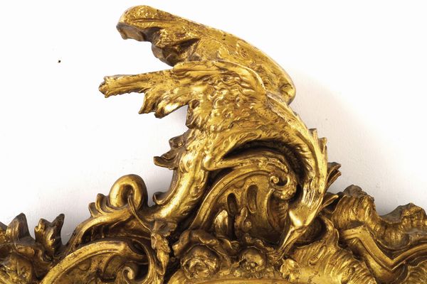 Cornice di forma ovale in legno intagliato e dorato. XIX secolo  - Asta Cornici antiche - Associazione Nazionale - Case d'Asta italiane