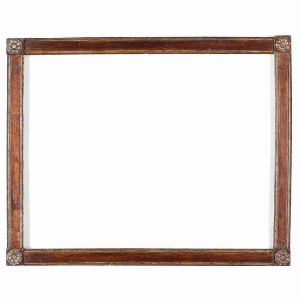 Cornice in stile Luigi XVI con decori intagliati agli angoli. XIX secolo  - Asta Cornici antiche - Associazione Nazionale - Case d'Asta italiane