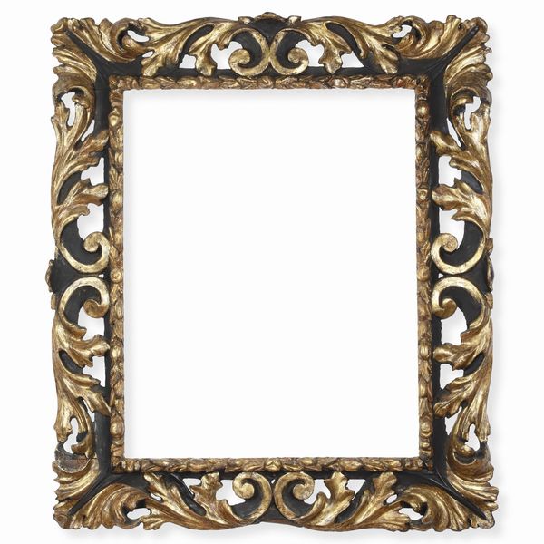 Cornice in legno intagliato, ebanizzato e dorato. Bologna XVII secolo  - Asta Cornici antiche - Associazione Nazionale - Case d'Asta italiane
