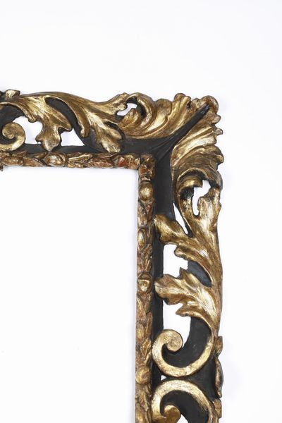 Cornice in legno intagliato, ebanizzato e dorato. Bologna XVII secolo  - Asta Cornici antiche - Associazione Nazionale - Case d'Asta italiane
