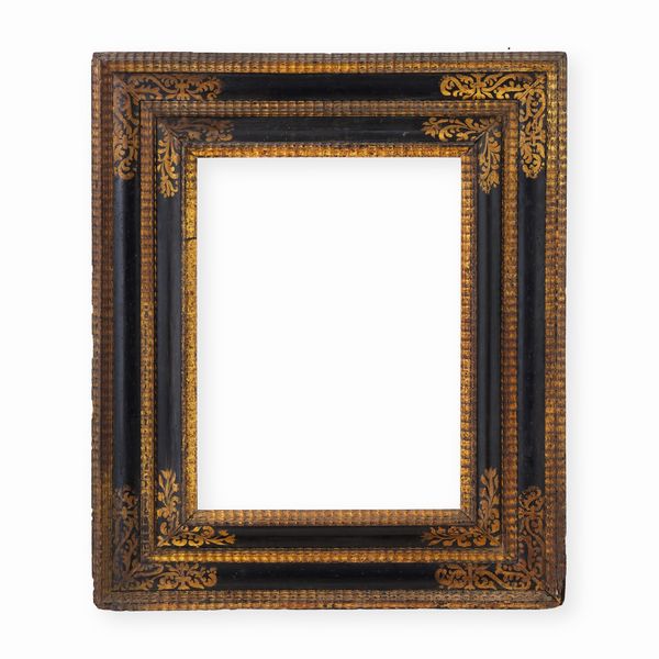 Cornice in legno ebanizzato e dorato. Lombardia XVIII secolo  - Asta Cornici antiche - Associazione Nazionale - Case d'Asta italiane