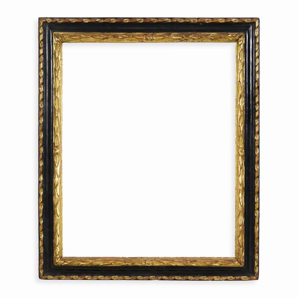 Cornice a cassetta in legno ebanizzato, intagliato e dorato. XVII secolo  - Asta Cornici antiche - Associazione Nazionale - Case d'Asta italiane