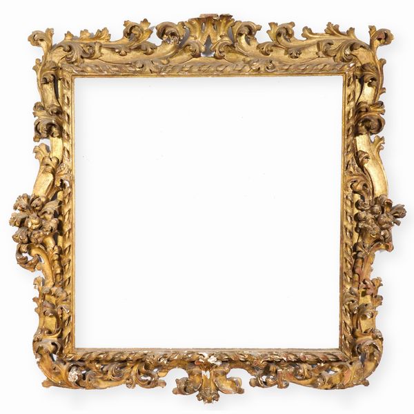Grande cornice in legno intagliato e dorato a motivi vegetali. Emilia XVII-XVIII secolo  - Asta Cornici antiche - Associazione Nazionale - Case d'Asta italiane