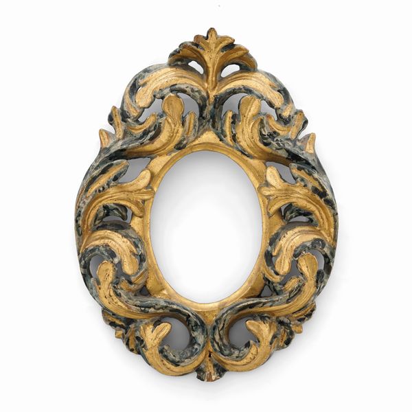Cornice ovale in legno intagliato, dipinto e dorato. XVIII secolo  - Asta Cornici antiche - Associazione Nazionale - Case d'Asta italiane