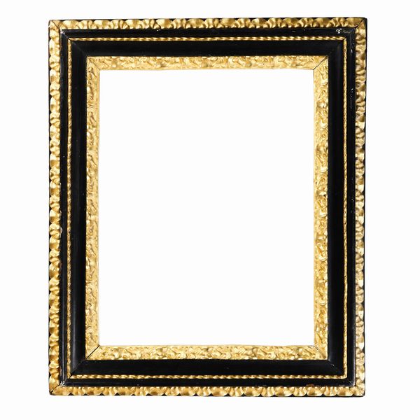 Cornice a sagoma Salvator Rosa ebanizzata e dorata. Italia centrale XVIII secolo  - Asta Cornici antiche - Associazione Nazionale - Case d'Asta italiane