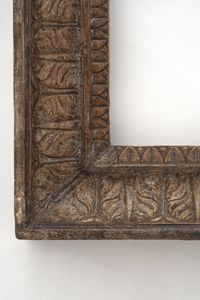 Cornice in legno intagliato a palmette con tracce di argentatura. XIX secolo  - Asta Cornici antiche - Associazione Nazionale - Case d'Asta italiane