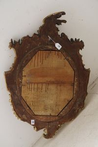 Cornice di forma ovale in legno intagliato e dorato. XIX secolo  - Asta Cornici antiche - Associazione Nazionale - Case d'Asta italiane