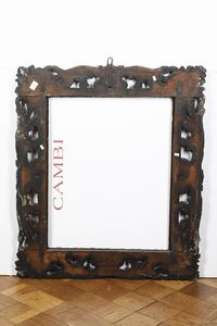 Cornice in legno intagliato, ebanizzato e dorato. Bologna XVII secolo  - Asta Cornici antiche - Associazione Nazionale - Case d'Asta italiane