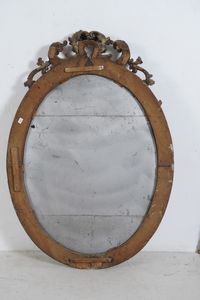 Cornice ovale in legno intagliato, laccato e dorato. XVIII-XIX secolo  - Asta Cornici antiche - Associazione Nazionale - Case d'Asta italiane