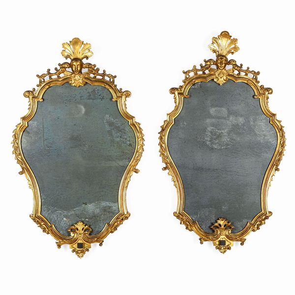 Coppia di specchiere intagliate e dorate. Genova, XVIII secolo  - Asta Dimore Italiane - Associazione Nazionale - Case d'Asta italiane