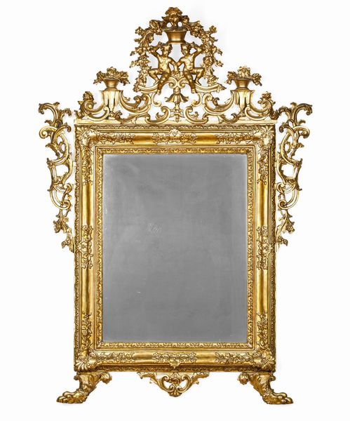 Specchiera in legno intagliato e dorato. Nord Italia XVIII secolo  - Asta Dimore Italiane - Associazione Nazionale - Case d'Asta italiane