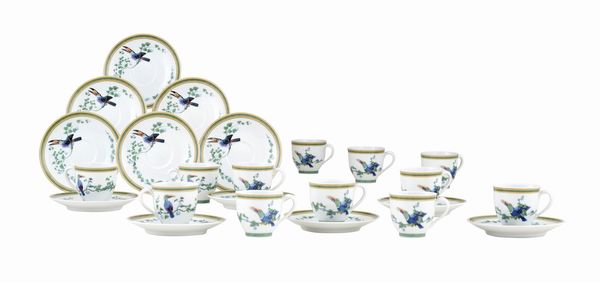 Dodici tazze da caff Herms Tucano.<BR>Francia, Manifattura di Limoges, fine XX - inizio XXI secolo.<BR>  - Asta Dimore Italiane - Associazione Nazionale - Case d'Asta italiane