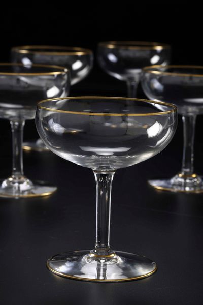 Sedici coppe da champagne, XX secolo.  - Asta  Arredi per la tavola - Associazione Nazionale - Case d'Asta italiane