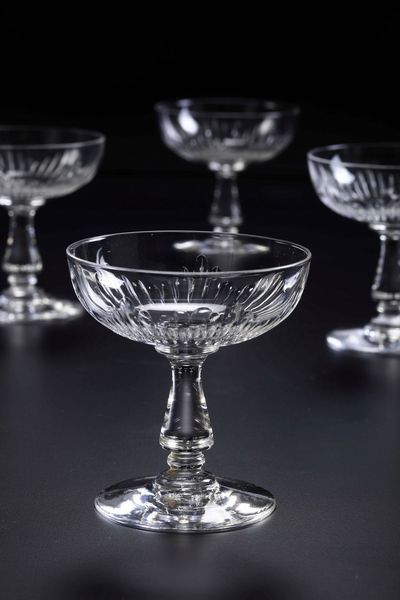 Dodici coppe da champagne.<BR>Probabilmente Baccarat, primi del XX secolo.  - Asta  Arredi per la tavola - Associazione Nazionale - Case d'Asta italiane